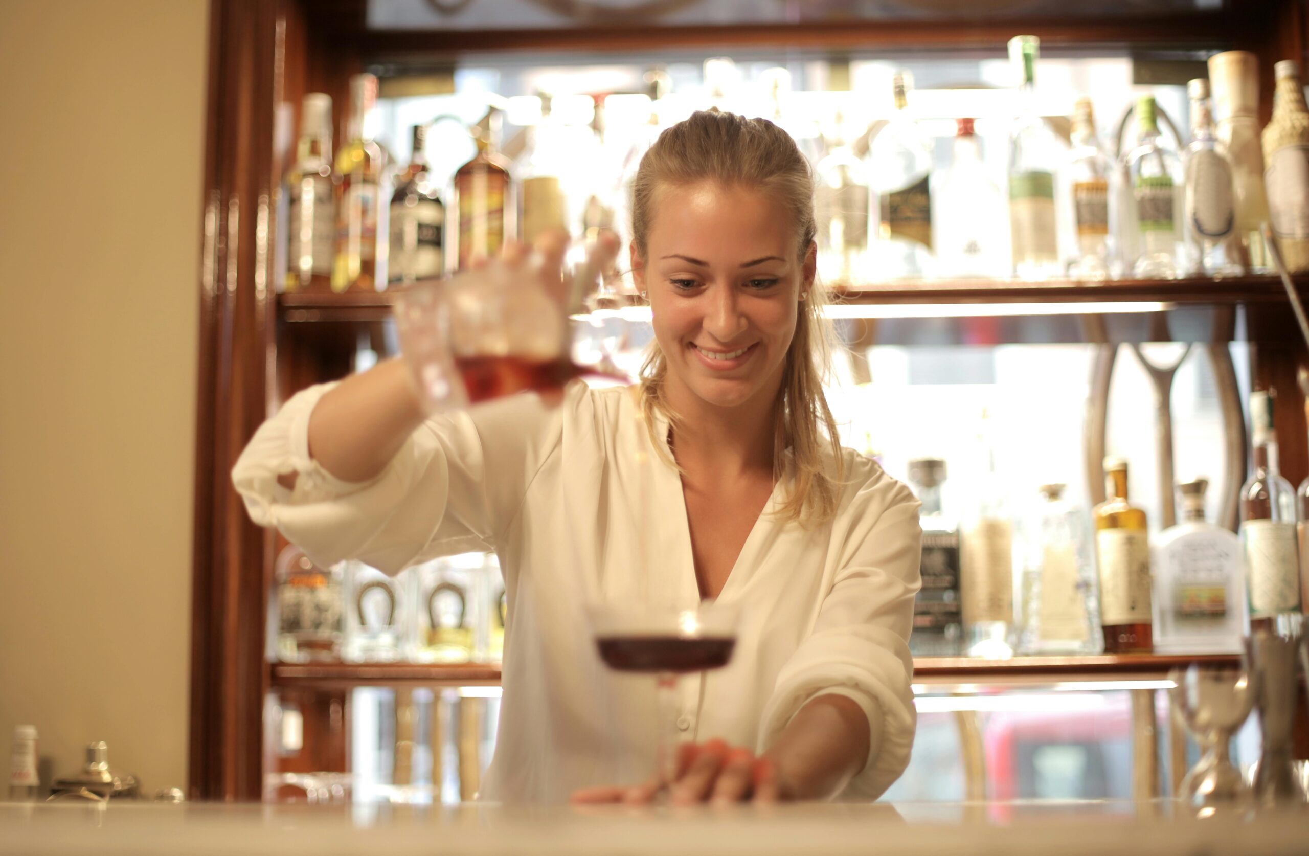 Bartender from legal age in bar restaurant serving